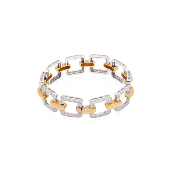 An 18ct rose and white gold round brilliant cut diamond set square link bracelet.