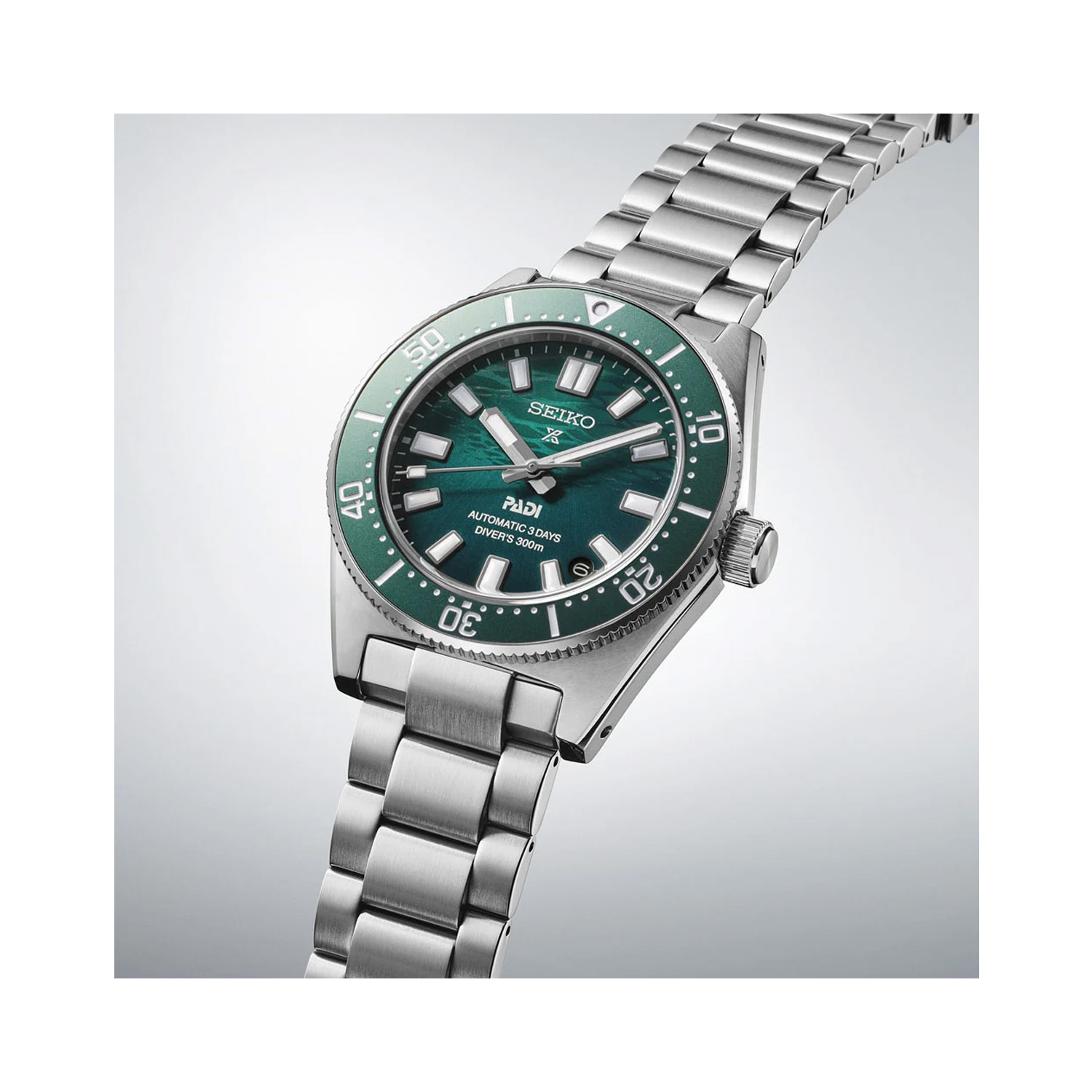 Seiko, Prospex Green 1965 Heritage Diver’s PADI Special Edition with a 42mm stainless steel case and bracelet strap featuring a date function and a green dial and bezel.