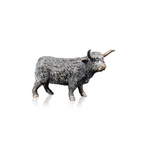 Made from solid foundry bronze, this piece depicts a standing Highland Cow.