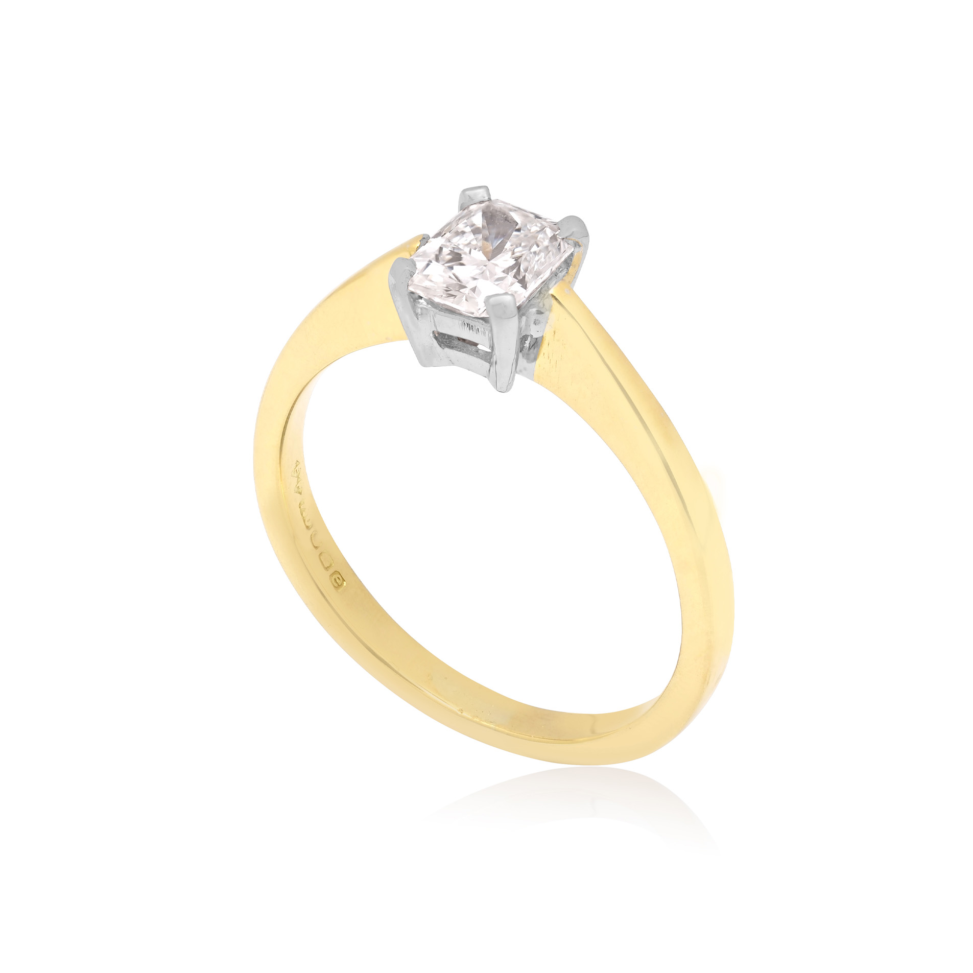 An 18ct yellow gold single stone radiant cut diamond ring, in a four claw setting.