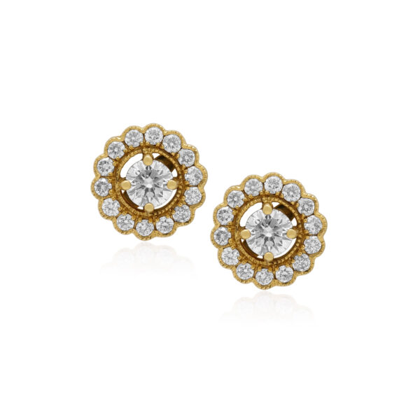 A pair of 18ct yellow gold round brilliant cut diamond set stud earrings, for pierced ears.