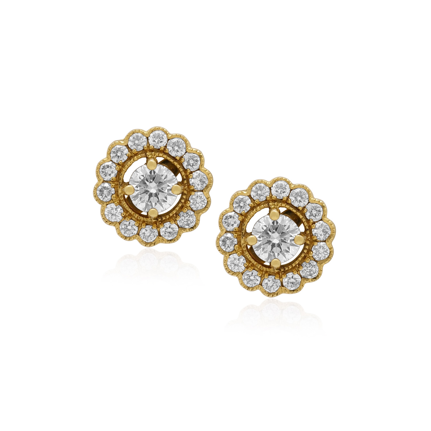 18ct Yellow Gold Diamond Cluster Earrings: 0.60 carats A pair of 18ct yellow gold round brilliant cut diamond set stud earrings, for pierced ears.