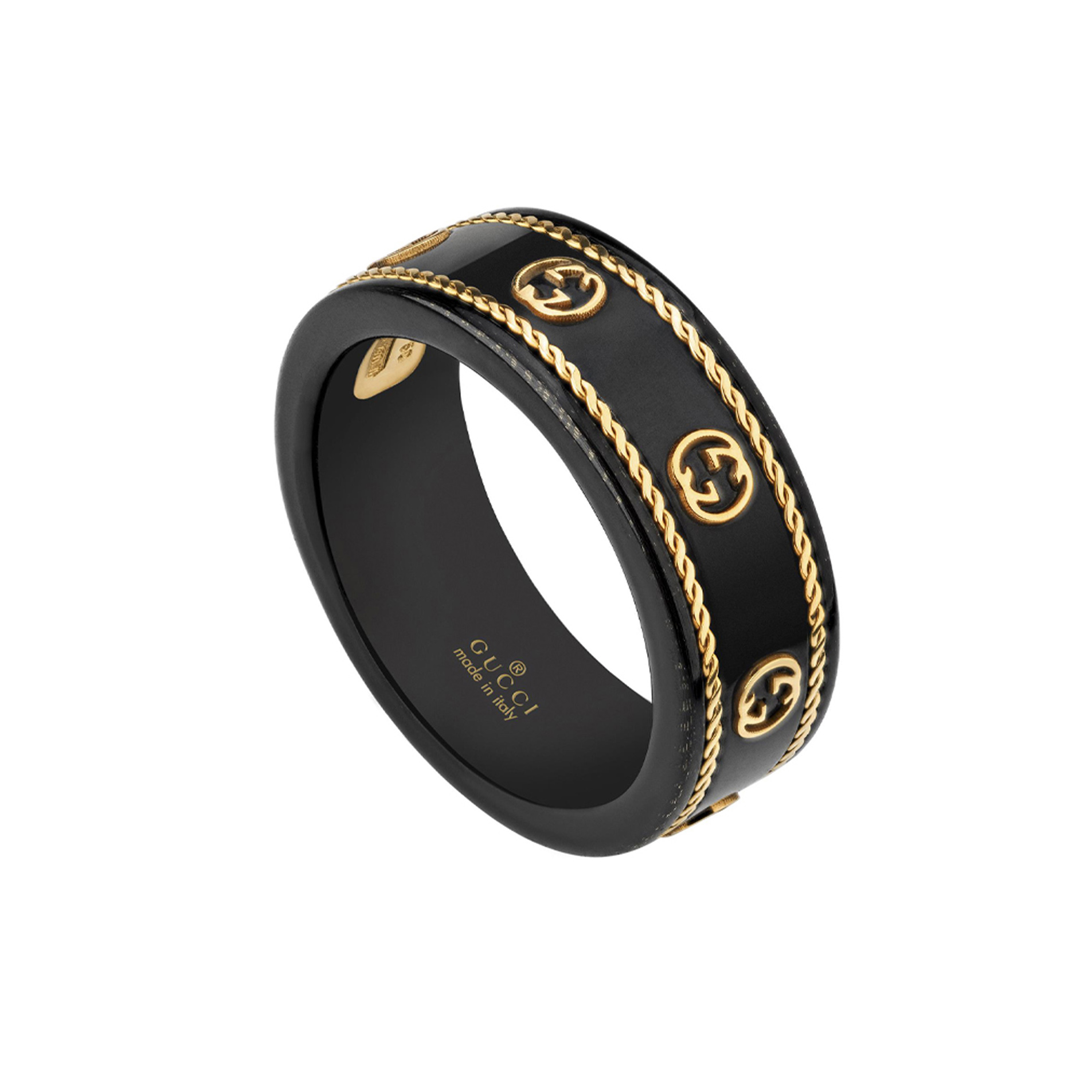 Gucci Icon, 18ct Yellow Gold Black Band An 18ct yellow gold and black synthetic corundum thin band featuring the G motif from Gucci's Icon collection.