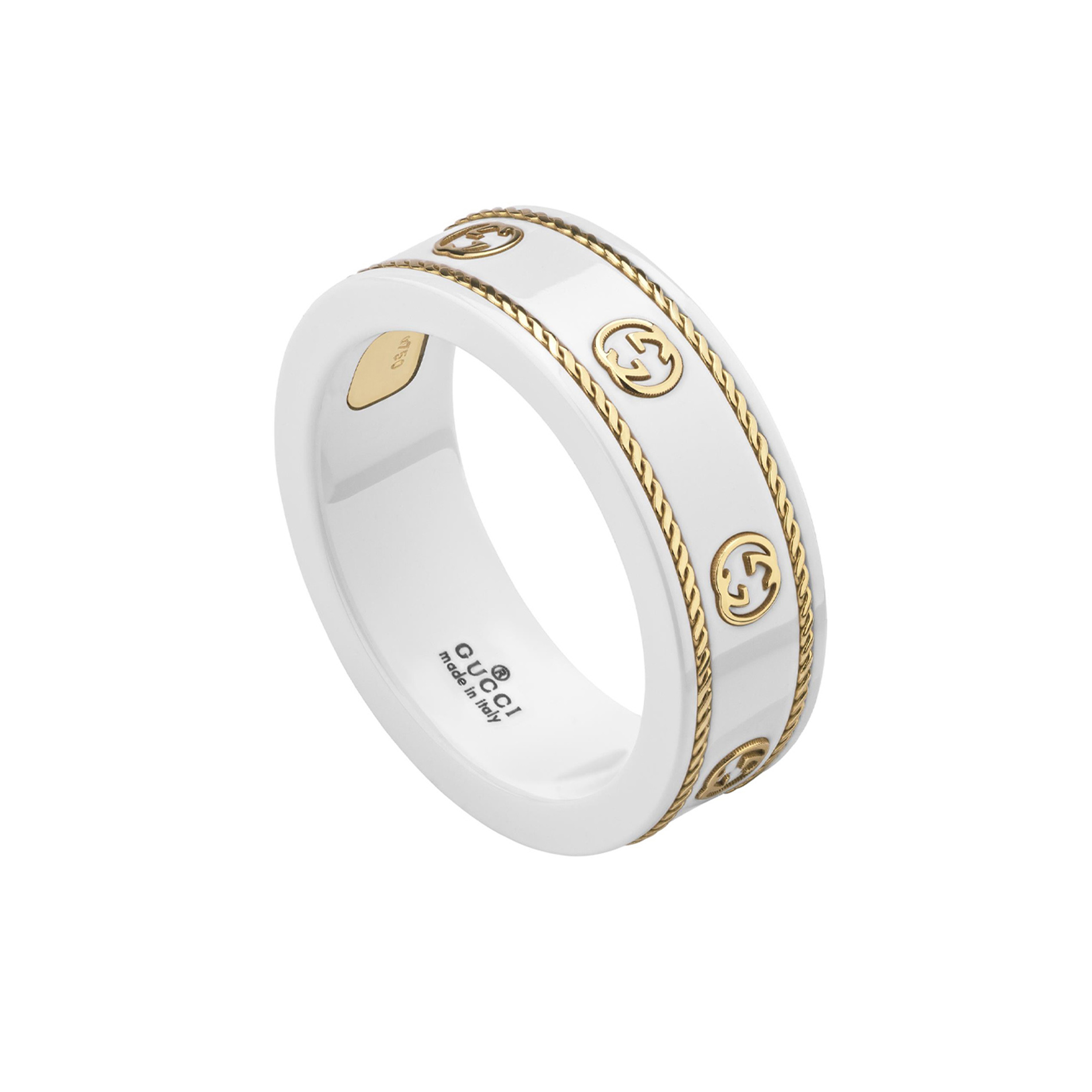 An 18ct yellow gold and white zirconium thin band featuring the G motif from Gucci's Icon collection.