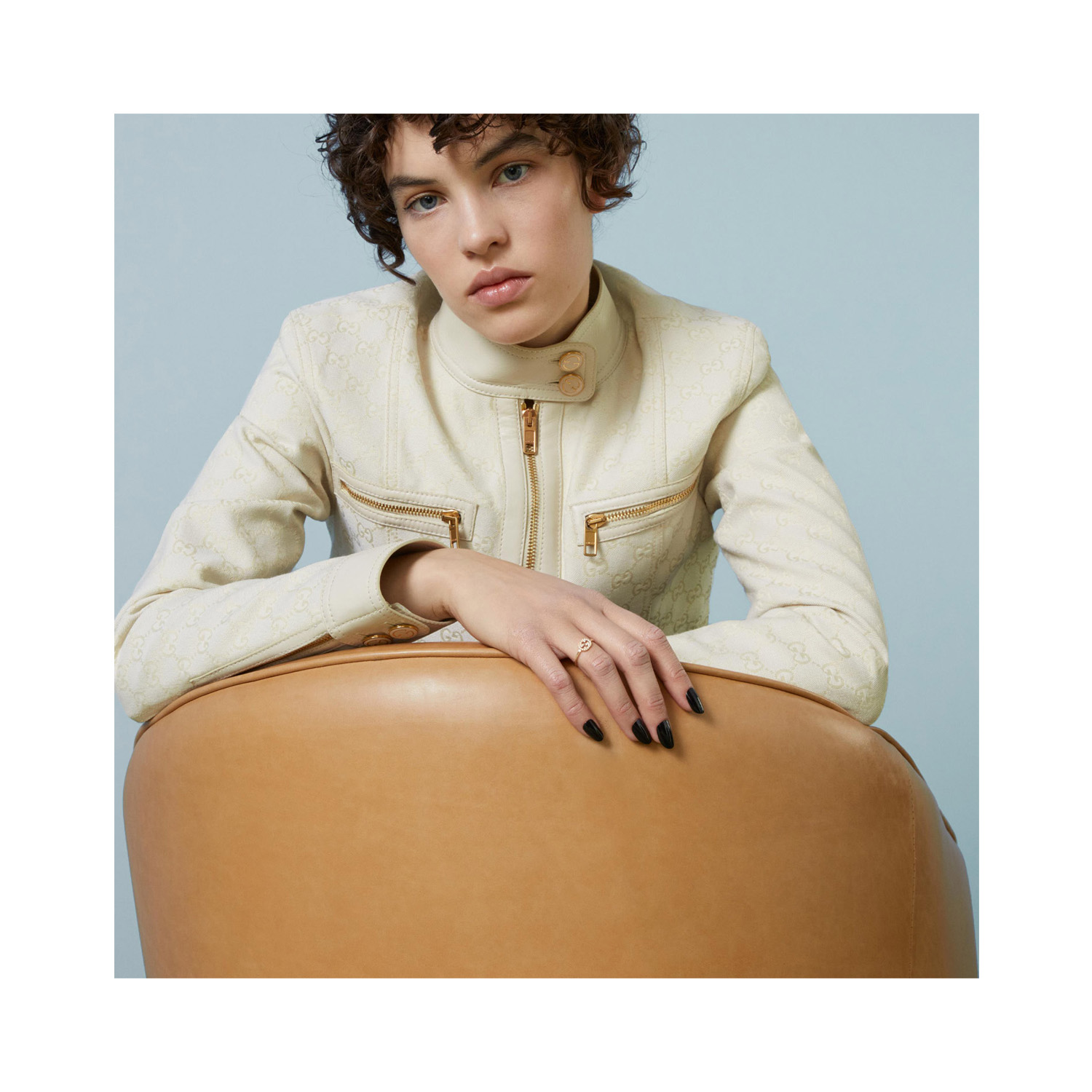 An 18ct yellow gold, round brilliant cut diamond set ring from the Gucci Interlocking collection.