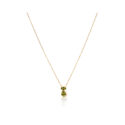 A 9ct yellow gold peridot cat pendant and chain, featuring an oval and pear shaped peridot with yellow gold ears and tail.