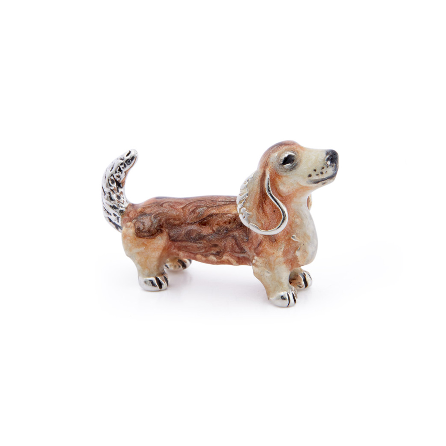 A sterling silver dachshund figurine from Saturno by Francis Howard.