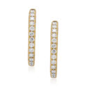 A pair of 18ct yellow gold diamond set hoop style earrings, featuring 13 round brilliant cut diamonds.