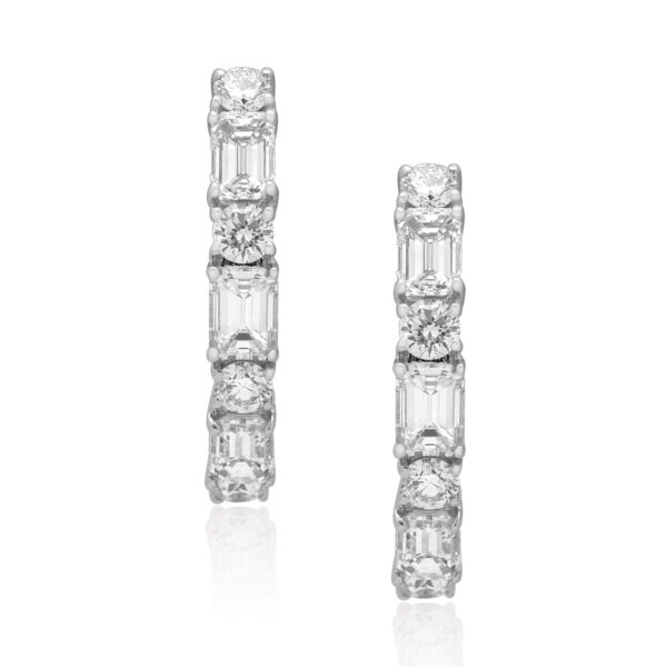 A pair of 18ct white gold emerald and round brilliant cut diamond hoop style earrings, for pierced ears.