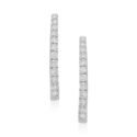 A pair of 18ct white gold round brilliant cut diamond hoop style earrings, for pierced ears.