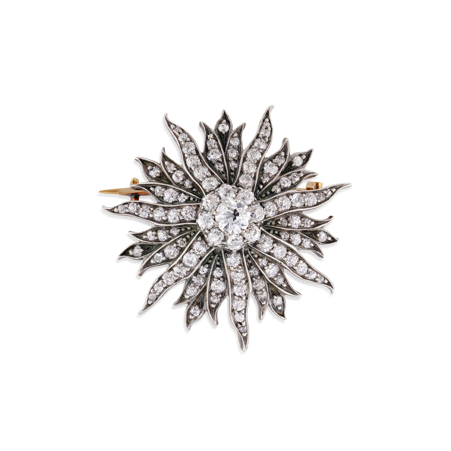 An impressive late Victorian diamond set sunburst brooch containing 100 old cut and rose cut diamonds.