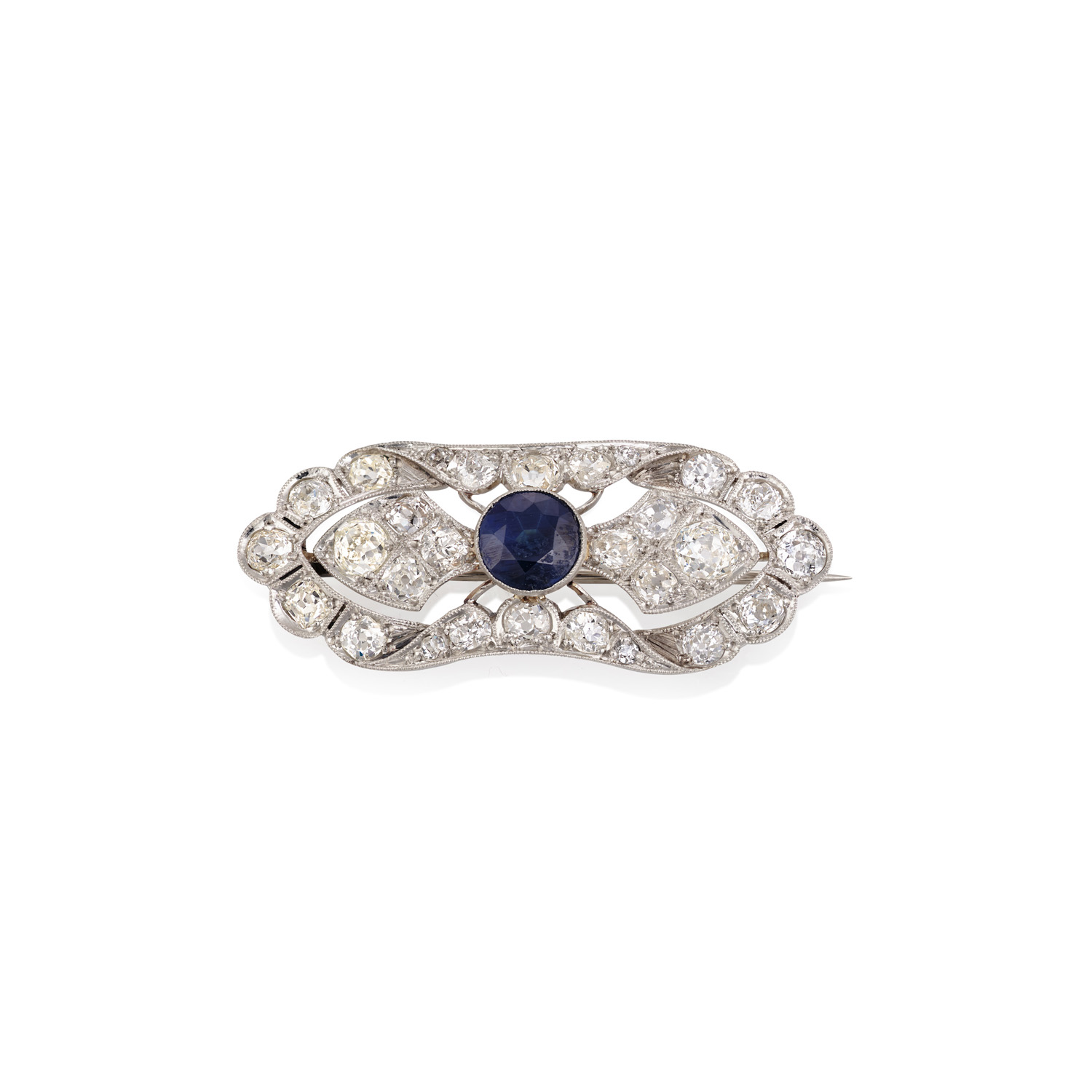 A platinum Art Deco sapphire and diamond plaque brooch. The central sapphire within a diamond set open work frame.