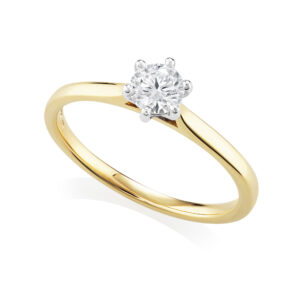 An 18ct yellow gold round brilliant cut diamond set single stone ring from H. L. Brown's Harris Collection. Wedding ring friendly.