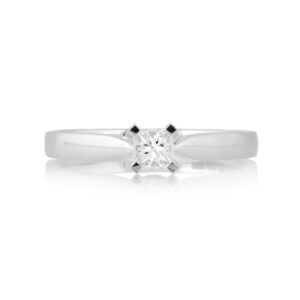 A platinum, princess cut diamond set single stone ring.