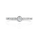 An 18ct white gold round brilliant cut diamond single stone ring with diamond set shoulders.