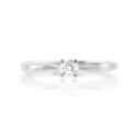 An 18ct white gold, round brilliant cut diamond single stone ring with twist-style shoulders.