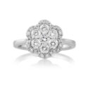 An 18ct white gold, flower shaped brilliant cut diamond set cluster ring.