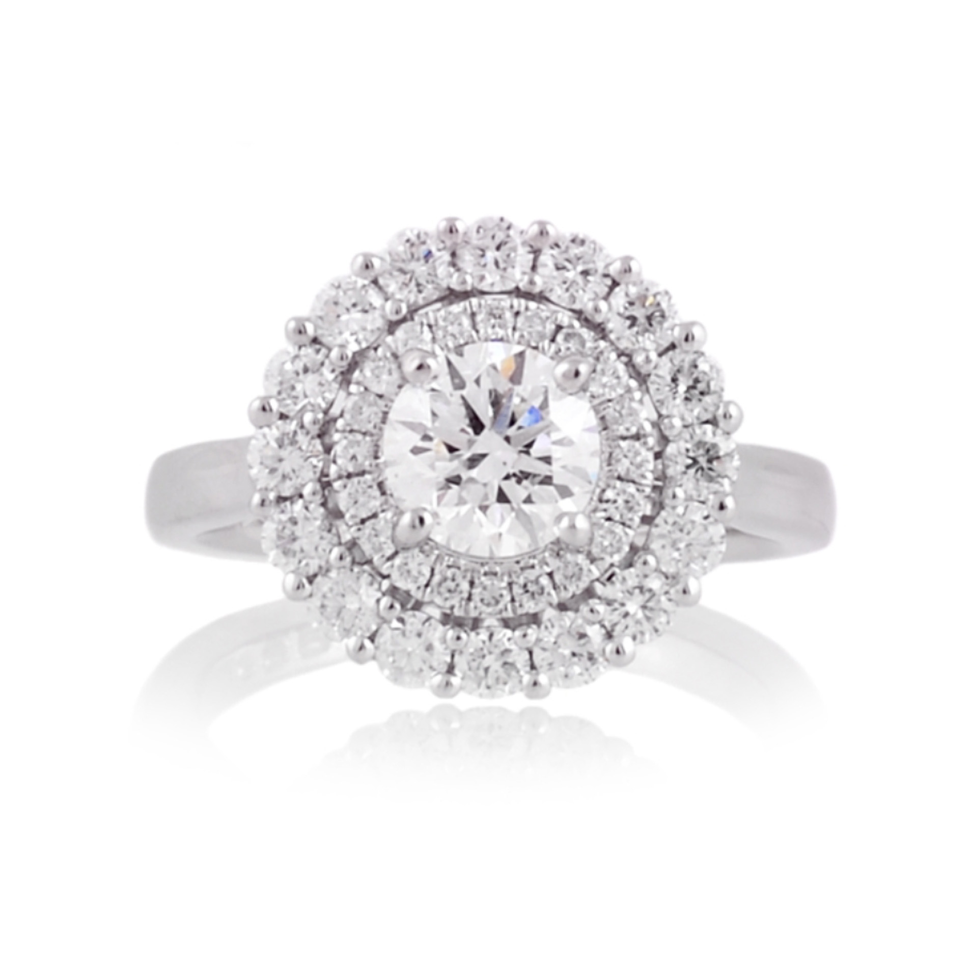 A platinum, diamond set double row fancy cluster ring set with brilliant cut diamonds.