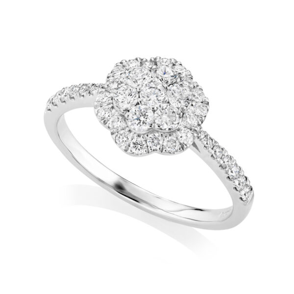 A platinum round brilliant cut diamond fancy cluster ring with diamond set shoulders.