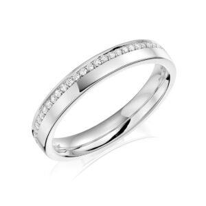 A platinum round brilliant cut diamond set band.