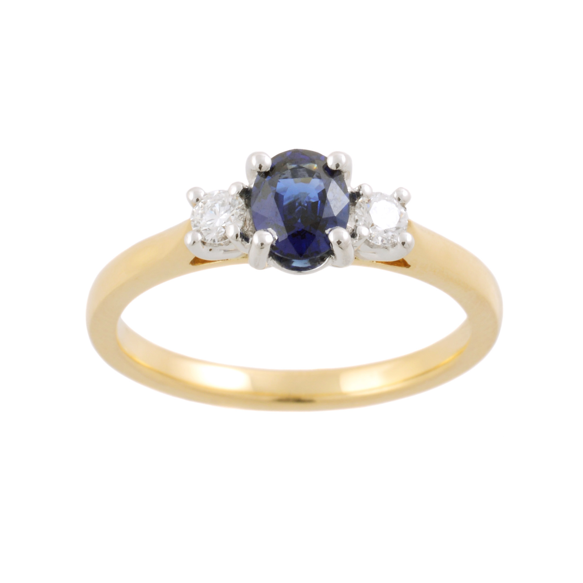 An 18ct yellow and white gold oval sapphire and round brilliant cut diamond three stone ring.