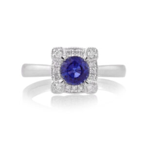 A platinum, sapphire and diamond set square shaped cluster ring.