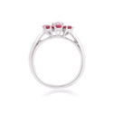 An 18ct white gold, ruby and diamond set flower cluster ring.