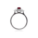 An 18ct white gold, ruby and two-row diamond set fancy cluster ring.
