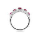 An 18ct white gold, ruby and diamond set five stone fancy cluster ring.
