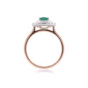 An 18ct yellow gold oval emerald and brilliant cut diamond double row cluster ring.
