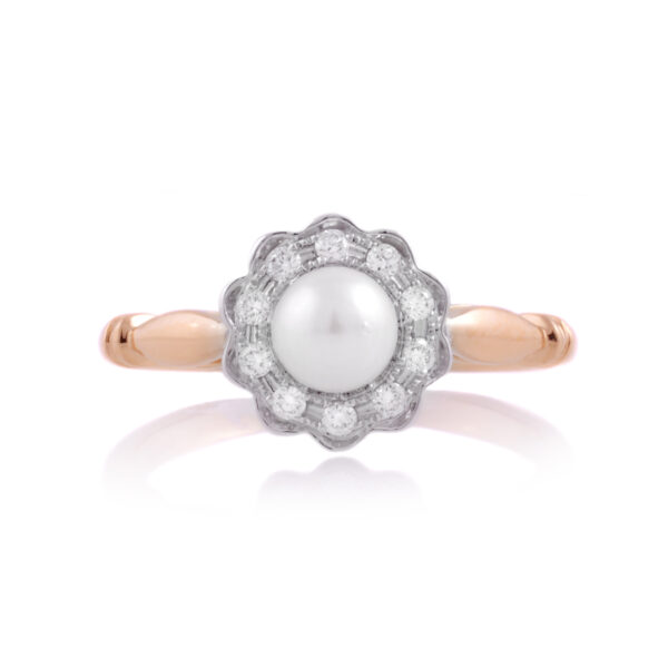 An 18ct yellow gold, pearl and diamond cluster ring.