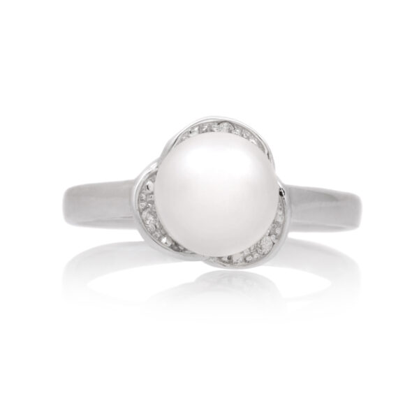 An 18ct white gold, cultured pearl and diamond set flower ring.