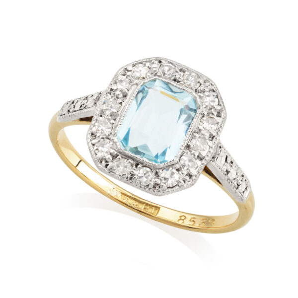 18ct yellow gold and platinum emerald cut aquamarine and diamond octagonal cluster ring.