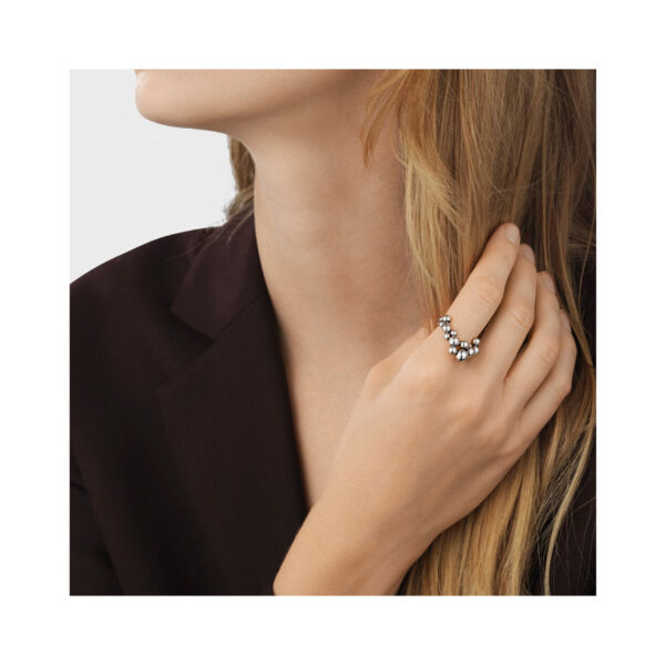 A sterling silver grape cluster ring belonging to Georg Jensen’s Moonlight Grapes collection.