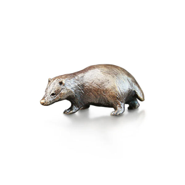 Made from solid foundry bronze, this piece depicts a small standing badger.