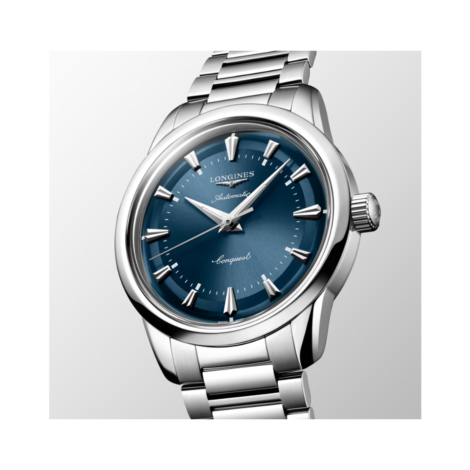 Longines, Conquest Heritage with a 38mm stainless steel case and bracelet strap featuring a blue dial.