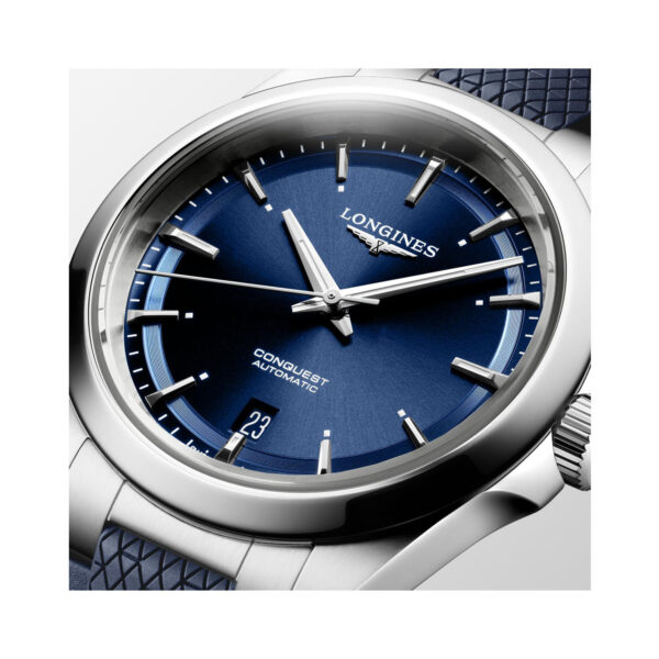 Longines, Conquest with a 38mm stainless steel case and blue rubber strap featuring a date function and a blue dial.