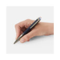 A Montblanc, StarWalker SpaceBlue Doué Ballpoint pen crafted in deep space blue coloured precious resin with the metal cap and fittings coated in dark ruthenium.