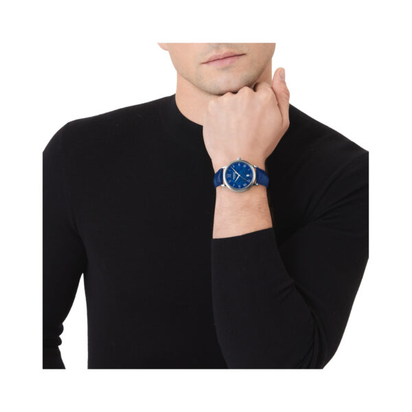 Montblanc, Tradition with a 40mm stainless steel case and a blue leather strap featuring a date function and a blue patterned dial.