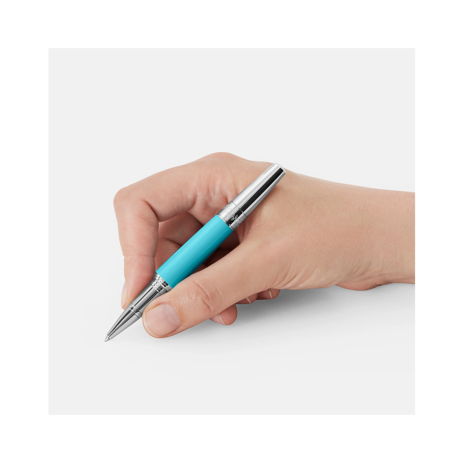 A Montblanc, Muses Maria Callas Special Edition Rollerball Pen crafted in turquoise precious resin featuring a platinum-coated clip, set with an elegant synthetic stone.