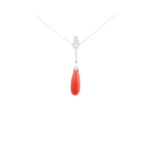 An 18ct white gold coral and diamond set drop pendant and chain.