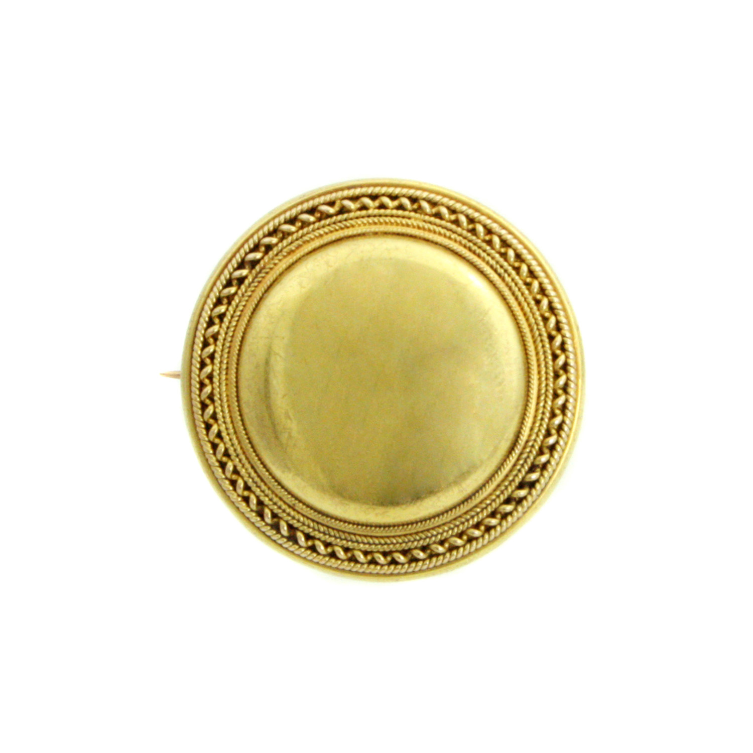 A Victorian era circular brooch with a pin that could also be worn as a locket on a chain.
