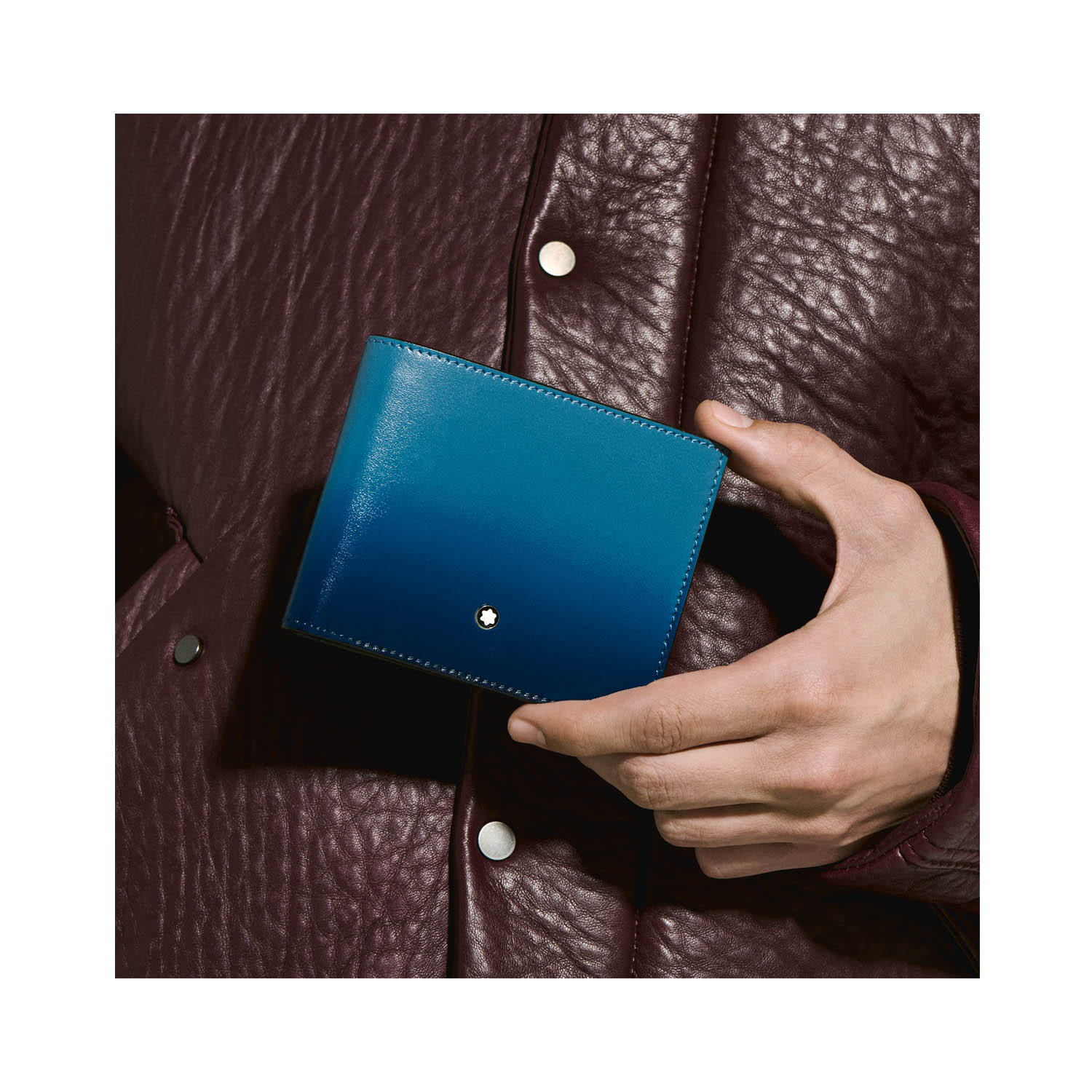 Montblanc, Meisterstück Smoky Blue 6cc Wallet Montblanc, Meisterstück smoky blue wallet crafted in leather with a manually appplied sfumato effect, featuring six credit card slots, two banknote compartments and two small additional pockets.