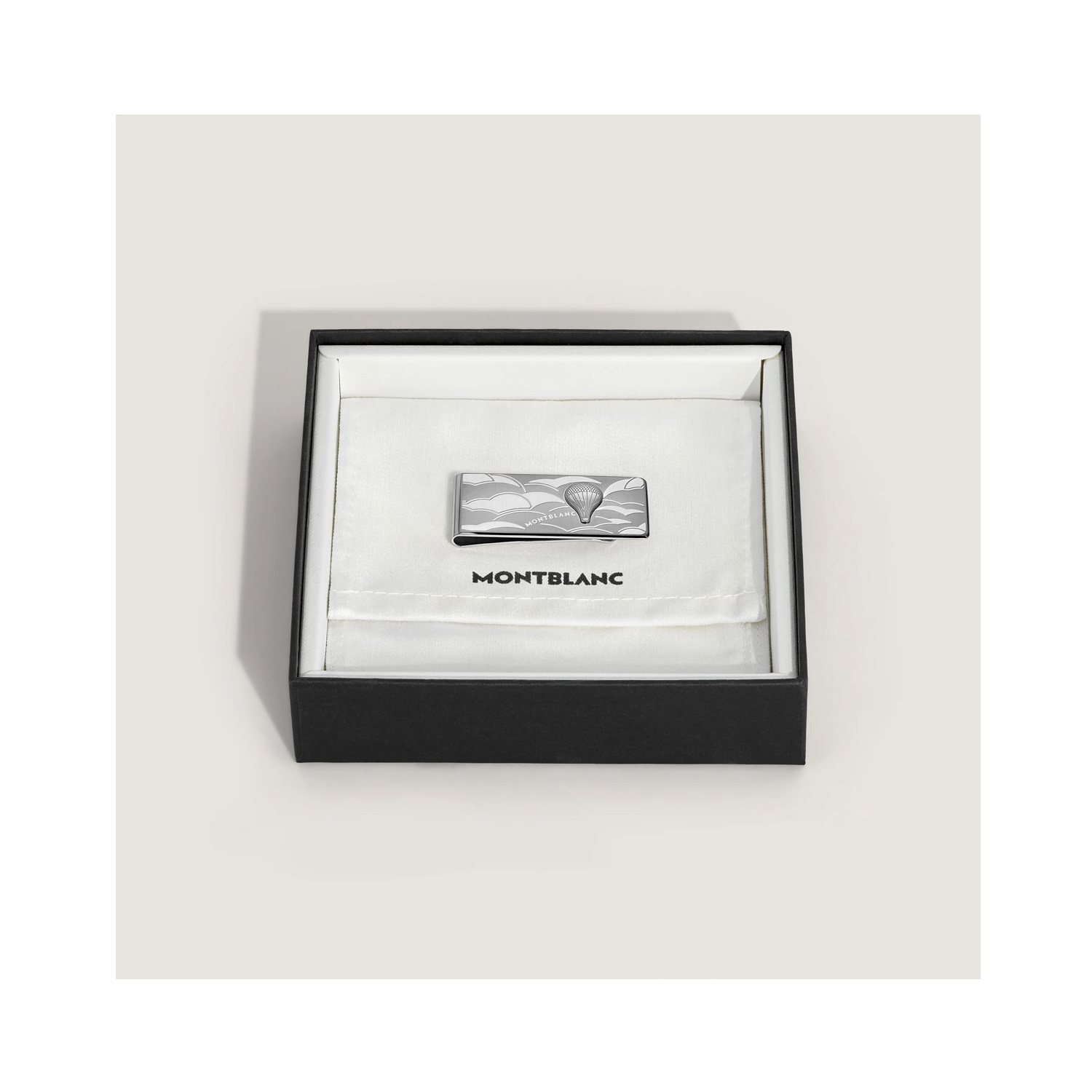A Montblanc, Meisterstück Around The World In 80 Days money clip crafted in stainless steel featuring a hot air balloon surrounded by clouds.