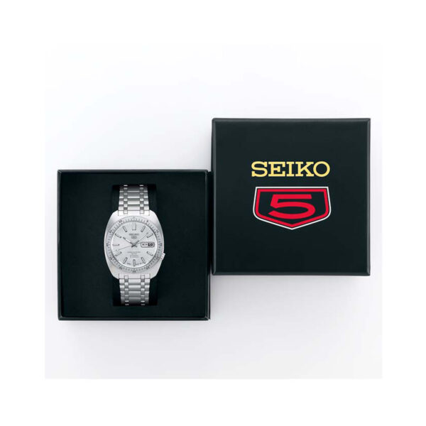 Seiko, 5 Sports 'Gene Kranz' Limited Edition with a 38.2mm stainless steel case and bracelet strap featuring a day date function and a silver dial and bezel.