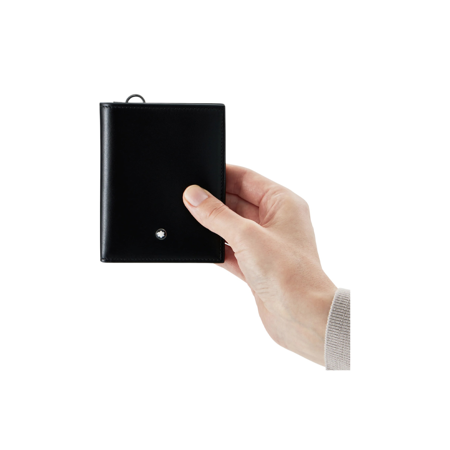 Montblanc, Meisterstück Black Compact 6cc Wallet A Montblanc, Meisterstück black compact wallet crafted from deep shine black leather featuring six credit card slots, a compartment for banknotes and two small additional pockets.