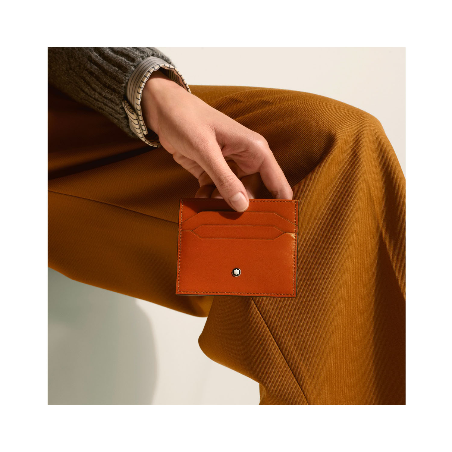 A Montblanc, Meisterstück rust coloured wallet crafted in finest leather with six credit or business card slots.