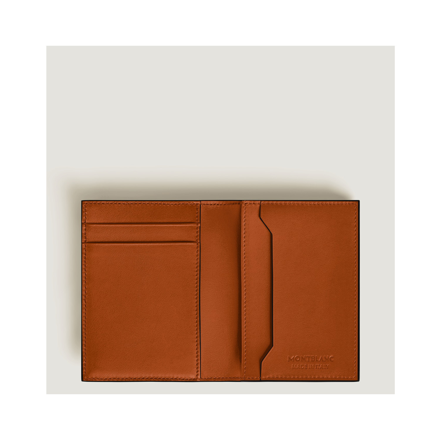 A Montblanc, Meisterstück card reader crafted in elegant rust-colour leather with four credit or business card slots.