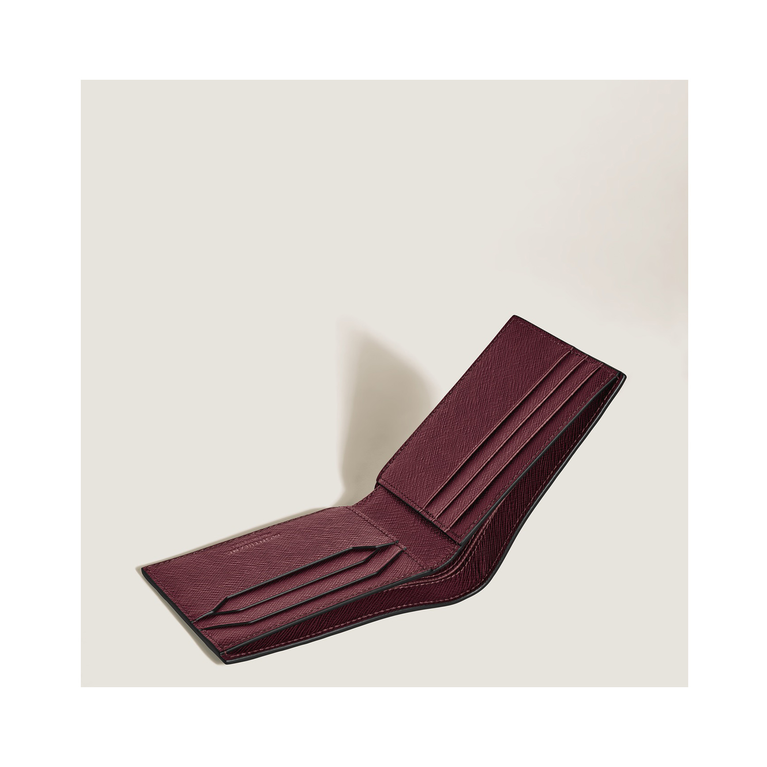 A Montblanc, Sartorial brown wallet crafted in Saffiano-printed leather with six credit card slots, two banknote compartments and two additional small pockets.