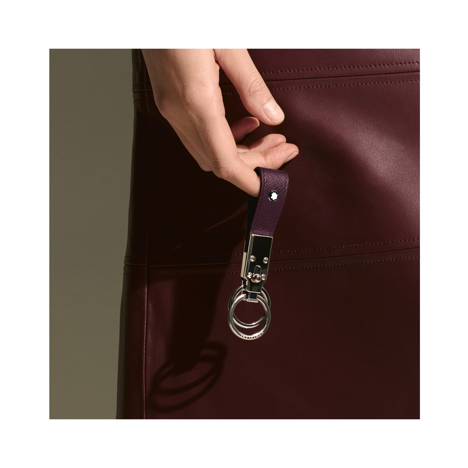 Montblanc, Sartorial Brown Loop Key Fob Montblanc, Sartorial loop key fob crafted in brown Saffiano-printed leather and shaped into a loop, featuring increased functionality with the detachable ring to loop in several keys.
